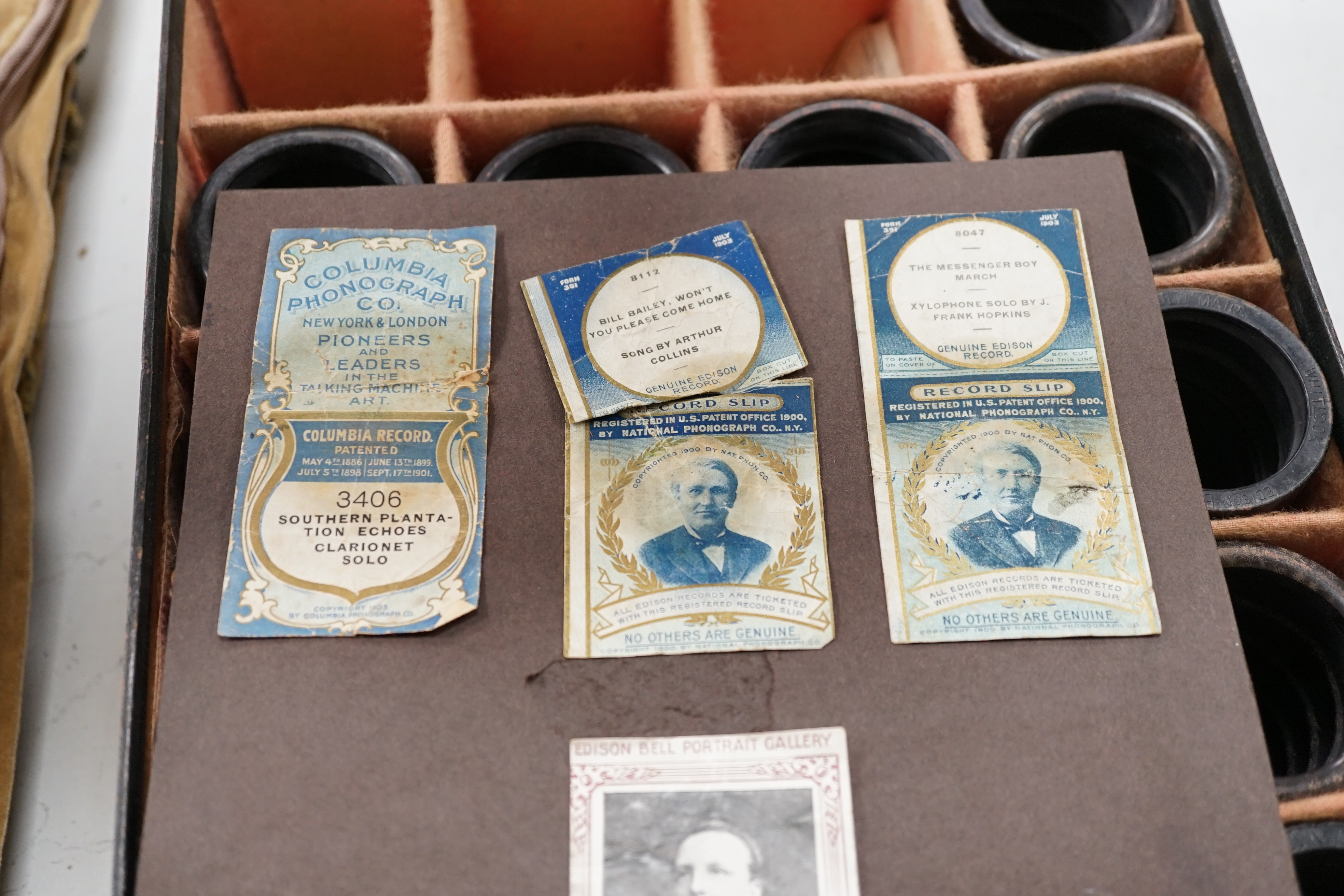 An oak cased Edison Little Gem phonograph with zinc horn and an original card box containing nineteen cylinders